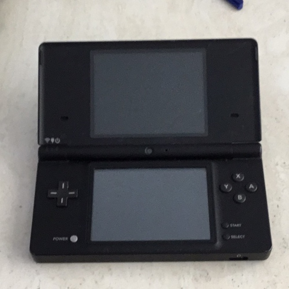 Nintendo DSi Console & 6 Nintendo DS Games Handheld System & Charger Toy Story - Picture 3 of 16